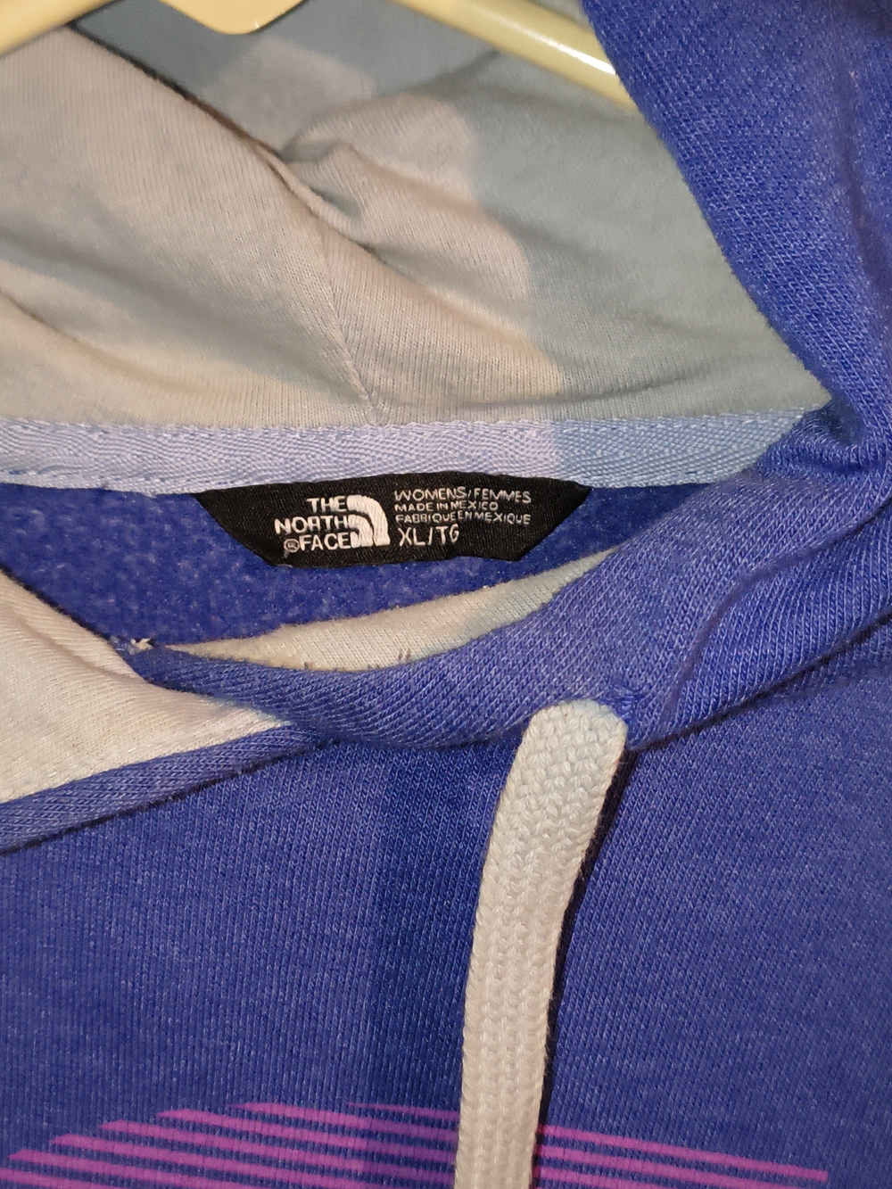 The North Face Women's Blue Zip-Up Hoodie with White Drawstring